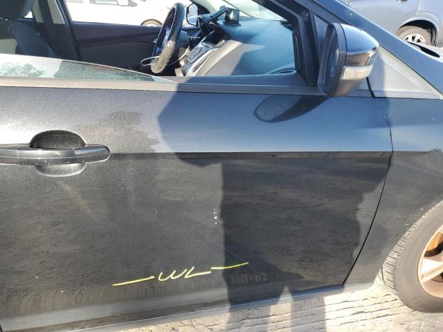 Photo 12 from auction – 2014 FORD FOCUS SE with VIN 1FADP3F20EL261115