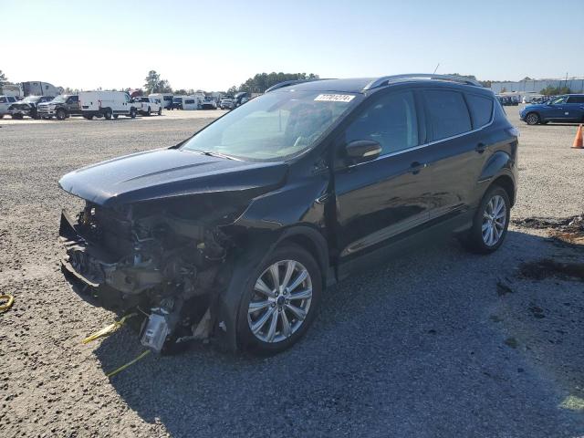 FORD ESCAPE TIT 2017 with VIN 1FMCU9J99HUC07795 - Photo from auction