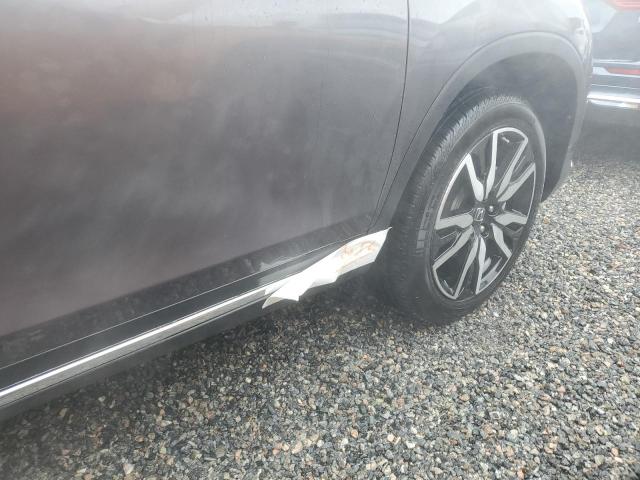 Photo 13 from auction – 2021 HONDA PILOT ELIT with VIN 5FNYF6H06MB093025