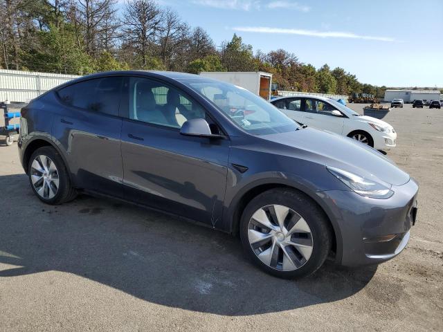 Photo 4 from auction – 2022 TESLA MODEL Y with VIN 7SAYGDEE2NF385227