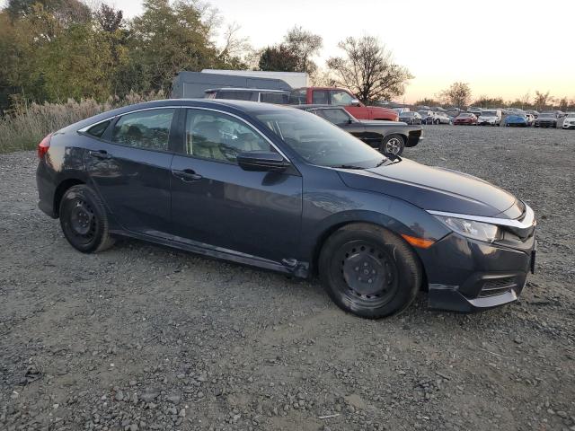 Photo 4 from auction – 2016 HONDA CIVIC LX with VIN 19XFC2F57GE204134