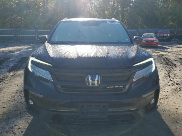 Photo 5 from auction – 2020 HONDA PILOT BLAC with VIN 5FNYF6H72LB007172