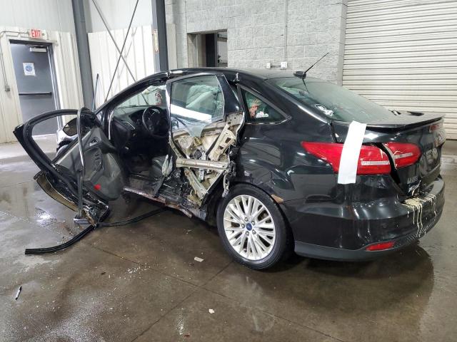 Photo 2 from auction – 2015 FORD FOCUS TITA with VIN 1FADP3J23FL369060