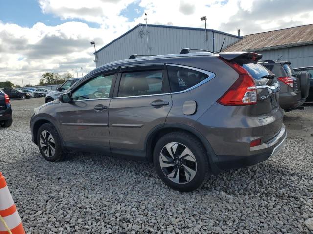 Photo 2 from auction – 2016 HONDA CR-V TOURI with VIN 5J6RM4H98GL024992