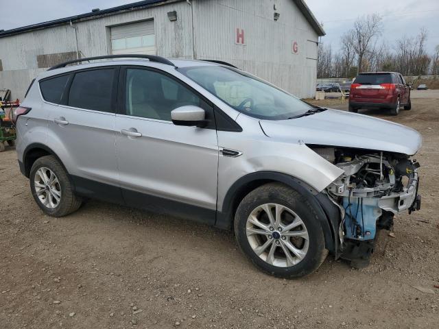 Photo 4 from auction – 2018 FORD ESCAPE SE with VIN 1FMCU9GD0JUB46404