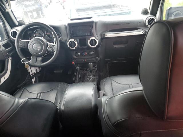 Photo 8 from auction – 2014 JEEP WRANGLER U with VIN 1C4BJWDG0EL223144