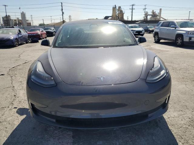Photo 5 from auction – 2021 TESLA MODEL 3 with VIN 5YJ3E1EA5MF068839