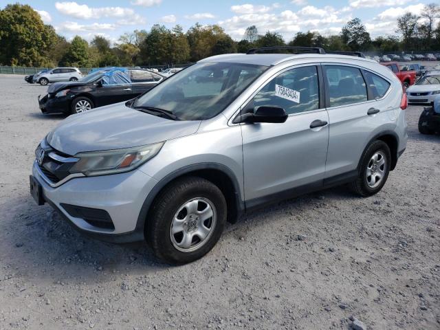 HONDA CR-V LX 2015 with VIN 3CZRM3H35FG705970 - Photo from auction
