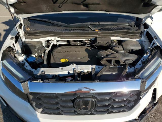 Photo 12 from auction – 2022 HONDA PASSPORT E with VIN 5FNYF8H55NB003534