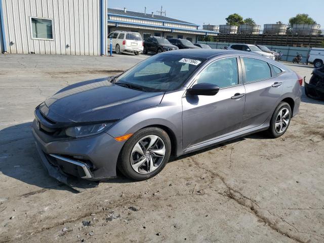 HONDA CIVIC LX 2019 with VIN 19XFC2F65KE010994 - Photo from auction