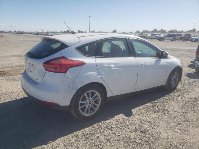 Photo 3 from auction – 2015 FORD FOCUS SE with VIN 1FADP3K21FL288752