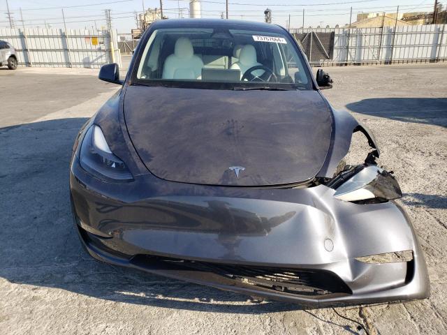 Photo 5 from auction – 2023 TESLA MODEL Y with VIN 7SAYGDEE6PF889833