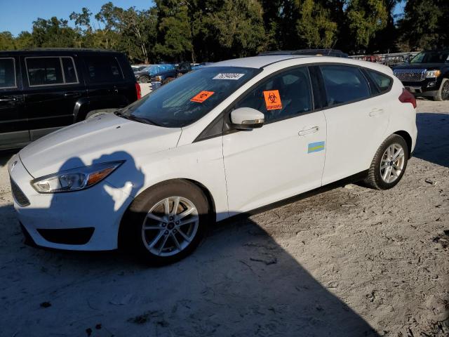 FORD FOCUS SE 2017 with VIN 1FADP3K29HL294477 - Photo from auction