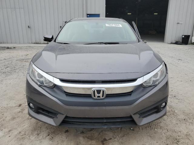 Photo 5 from auction – 2017 HONDA CIVIC EX with VIN 19XFC1F34HE002054
