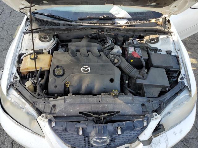 Photo 11 from auction – 2003 MAZDA 6 S with VIN 1YVHP80D635M14806