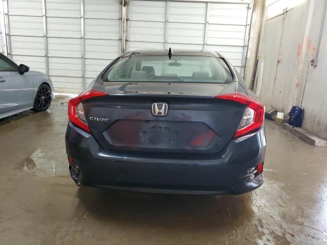 Photo 6 from auction – 2018 HONDA CIVIC EX with VIN 19XFC2F77JE008753