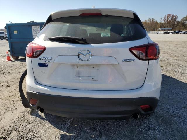 Photo 6 from auction – 2013 MAZDA CX-5 SPORT with VIN JM3KE4BEXD0158031