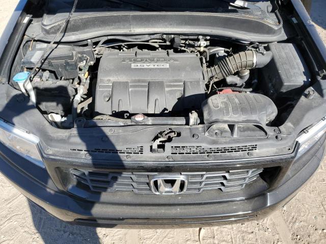 Фото 11 с аукциона – 2014 HONDA RIDGELINE с VIN 5FPYK1F69EB011903