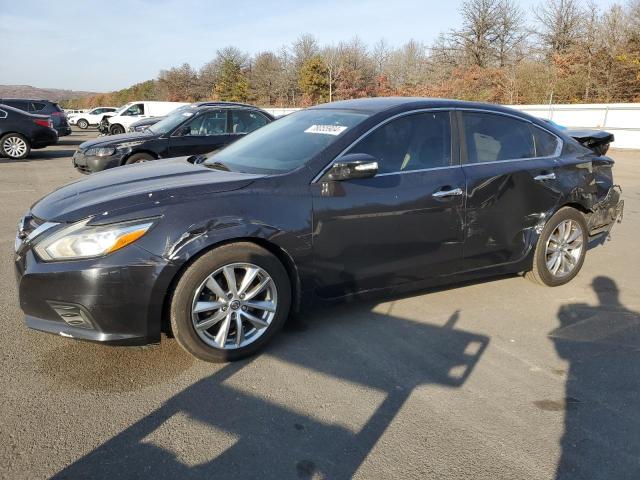 NISSAN ALTIMA 2.5 2017 with VIN 1N4AL3AP7HC239599 - Photo from auction