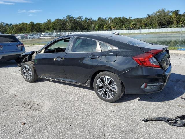 Photo 2 from auction – 2016 HONDA CIVIC EX with VIN 19XFC1F3XGE037910