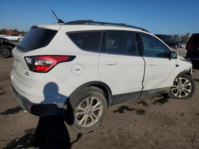 Photo 3 from auction – 2018 FORD ESCAPE SE with VIN 1FMCU0GD0JUA25528