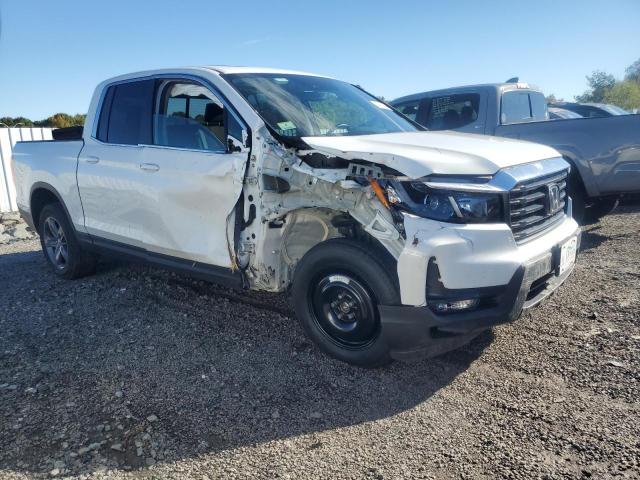 Photo 4 from auction – 2022 HONDA RIDGELINE with VIN 5FPYK3F53NB021006