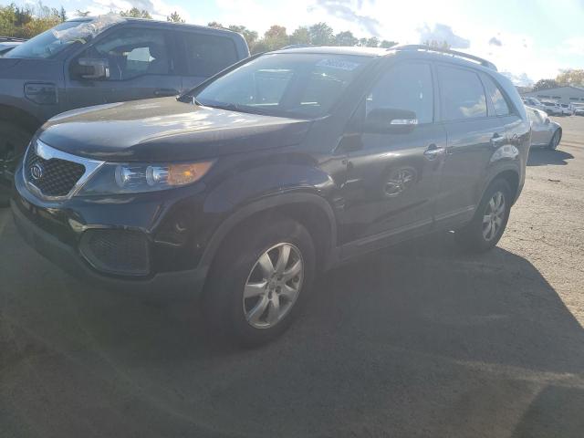 KIA SORENTO LX 2013 with VIN 5XYKT4A2XDG401563 - Photo from auction