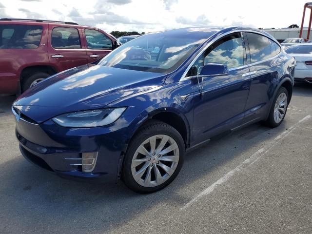 TESLA MODEL X 2017 with VIN 5YJXCAE29HF034862 - Photo from auction