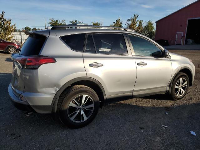Photo 3 from auction – 2018 TOYOTA RAV4 LE with VIN 2T3ZFREV0JW486448