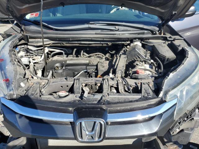 Photo 12 from auction – 2015 HONDA CR-V LX with VIN 5J6RM4H33FL102265