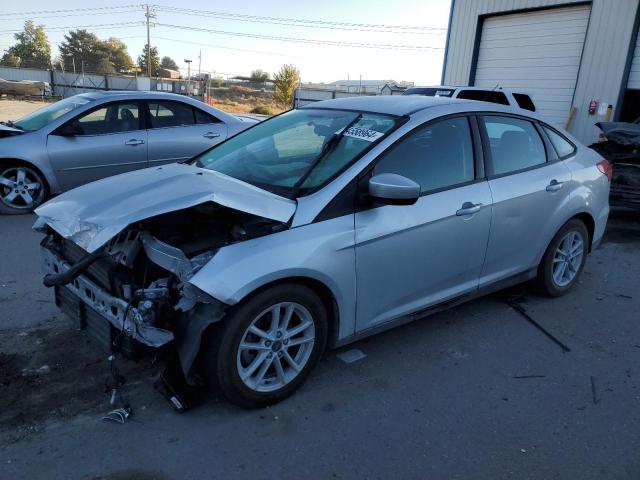 FORD FOCUS SE 2018 with VIN 1FADP3F20JL327270 - Photo from auction