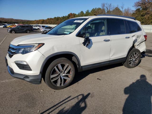 Photo 1 from auction – 2017 HONDA PILOT TOUR with VIN 5FNYF6H92HB022277
