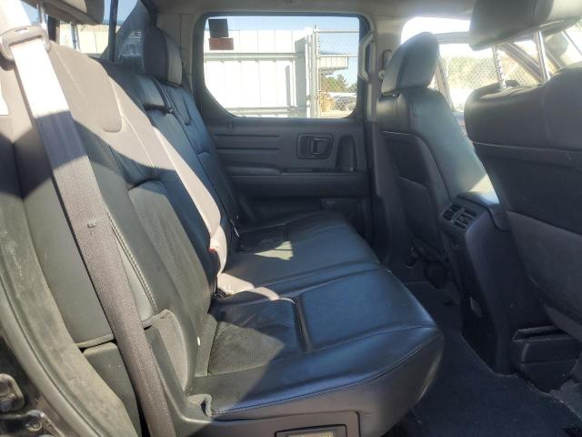 Photo 10 from auction – 2014 HONDA RIDGELINE with VIN 5FPYK1F52EB005562