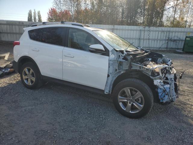 Photo 4 from auction – 2015 TOYOTA RAV4 XLE with VIN JTMRFREV6FD129702