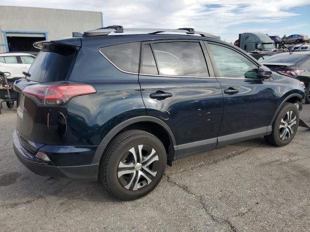 Photo 3 from auction – 2018 TOYOTA RAV4 LE with VIN 2T3ZFREV6JW460811