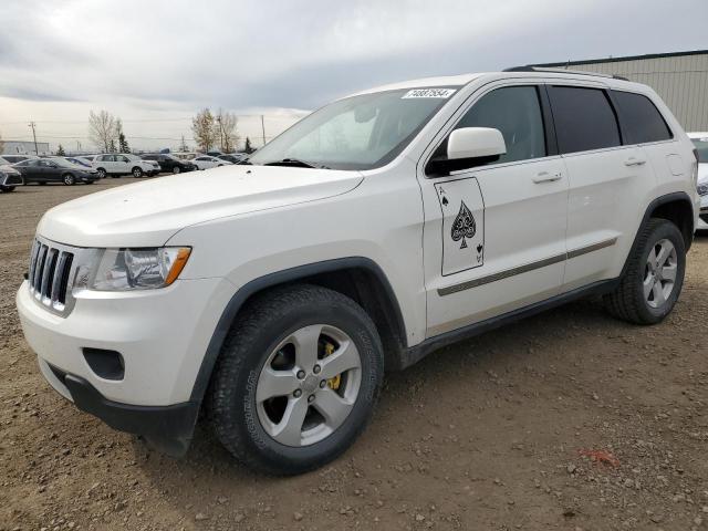 JEEP GRAND CHER 2011 with VIN 1J4RR4GG9BC509572 - Photo from auction