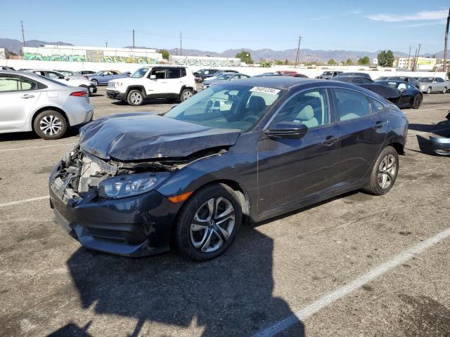 HONDA CIVIC LX 2018 with VIN 2HGFC2F57JH548415 - Photo from auction