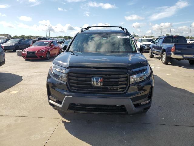 Photo 5 from auction – 2021 HONDA RIDGELINE with VIN 5FPYK3F85MB017306