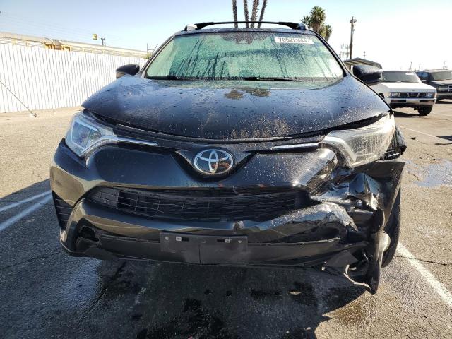 Photo 5 from auction – 2018 TOYOTA RAV4 LE with VIN 2T3ZFREVXJW469639