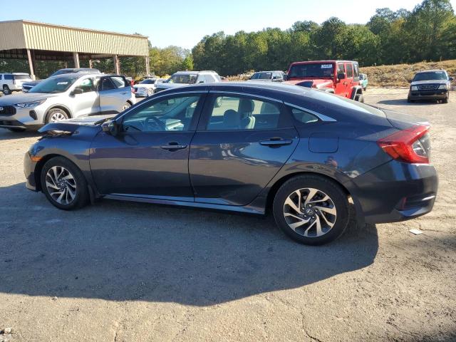 Photo 2 from auction – 2018 HONDA CIVIC EX with VIN 19XFC2F74JE040060