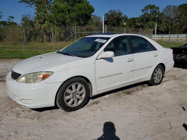 TOYOTA CAMRY LE 2002 con VIN 4T1BF32K82U024643 - Foto de la subasta