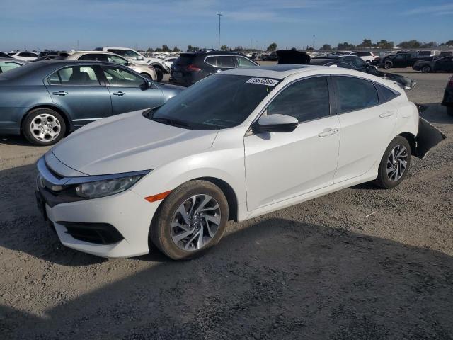 HONDA CIVIC EX 2018 with VIN 2HGFC2F71JH540294 - Photo from auction