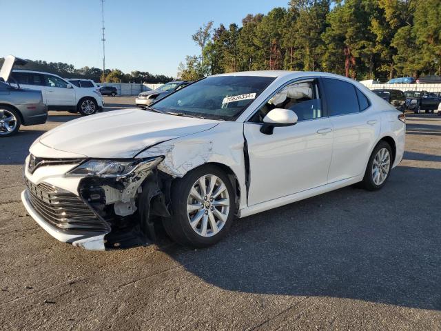 TOYOTA CAMRY LE 2020 with VIN 4T1C11AK2LU979500 - Photo from auction