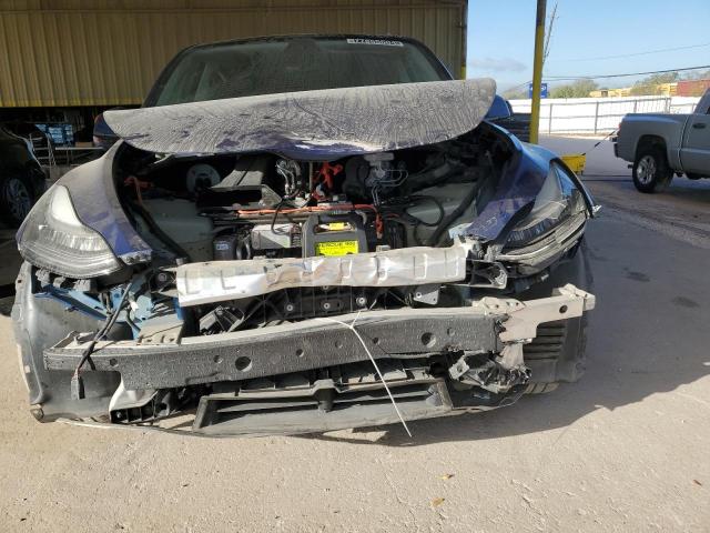Photo 5 from auction – 2022 TESLA MODEL Y with VIN 7SAYGDEE7NF480656