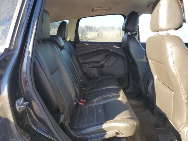 Photo 11 from auction – 2014 FORD ESCAPE SE with VIN 1FMCU9G99EUD62799