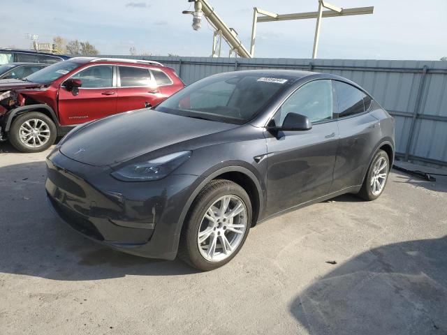 TESLA MODEL Y 2024 with VIN 7SAYGDEE1RF990460 - Photo from auction
