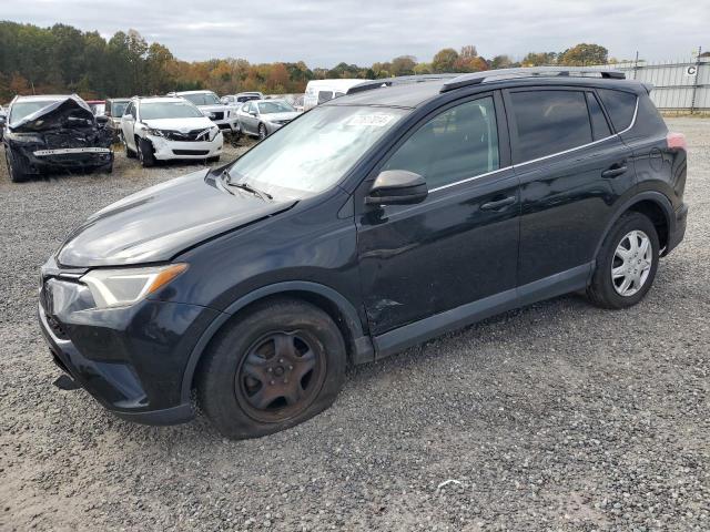TOYOTA RAV4 LE 2017 with VIN 2T3BFREV3HW591559 - Photo from auction