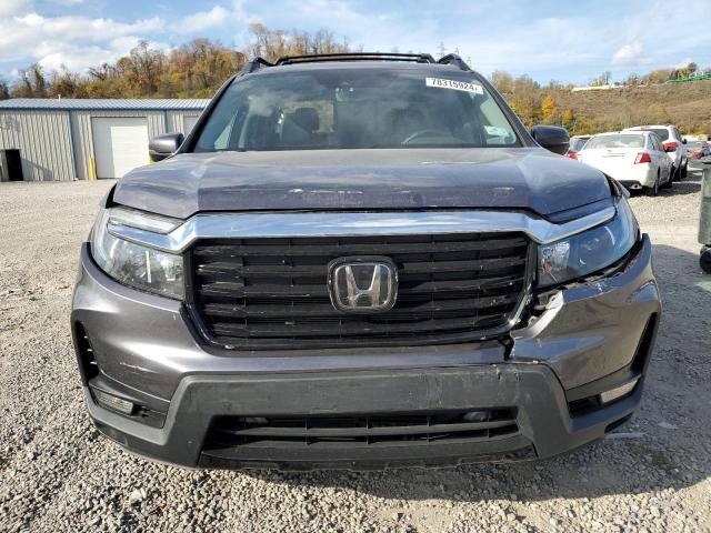 Photo 5 from auction – 2022 HONDA RIDGELINE with VIN 5FPYK3F77NB004386