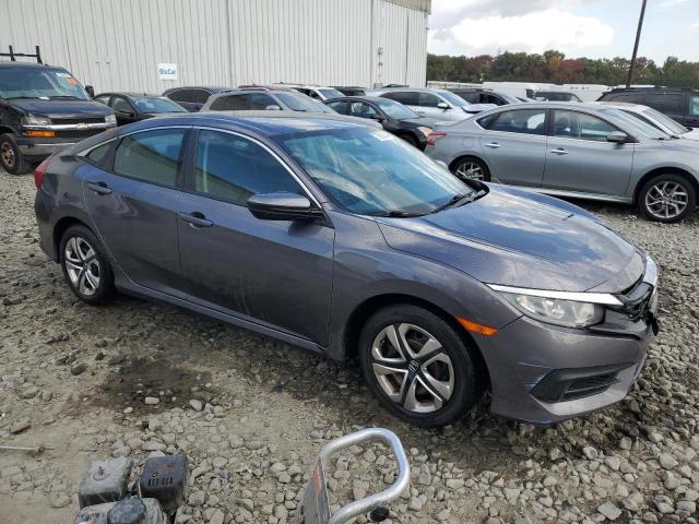 Photo 4 from auction – 2016 HONDA CIVIC LX with VIN 19XFC2F56GE051925