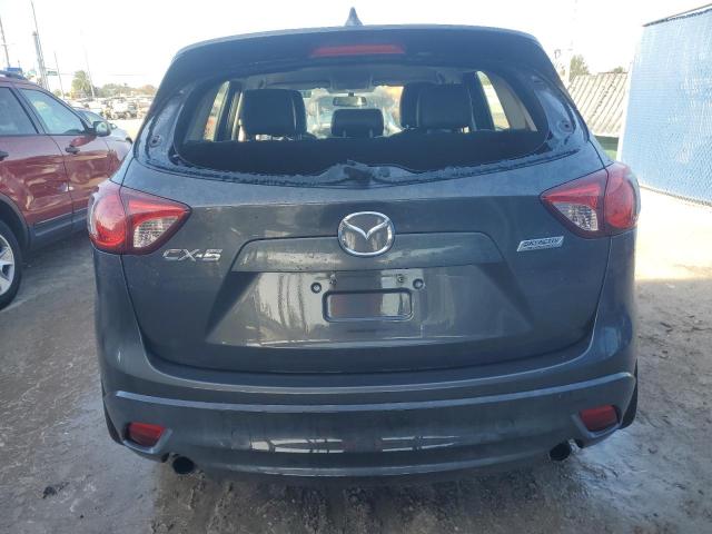 Photo 6 from auction – 2014 MAZDA CX-5 SPORT with VIN JM3KE2BE9E0301993